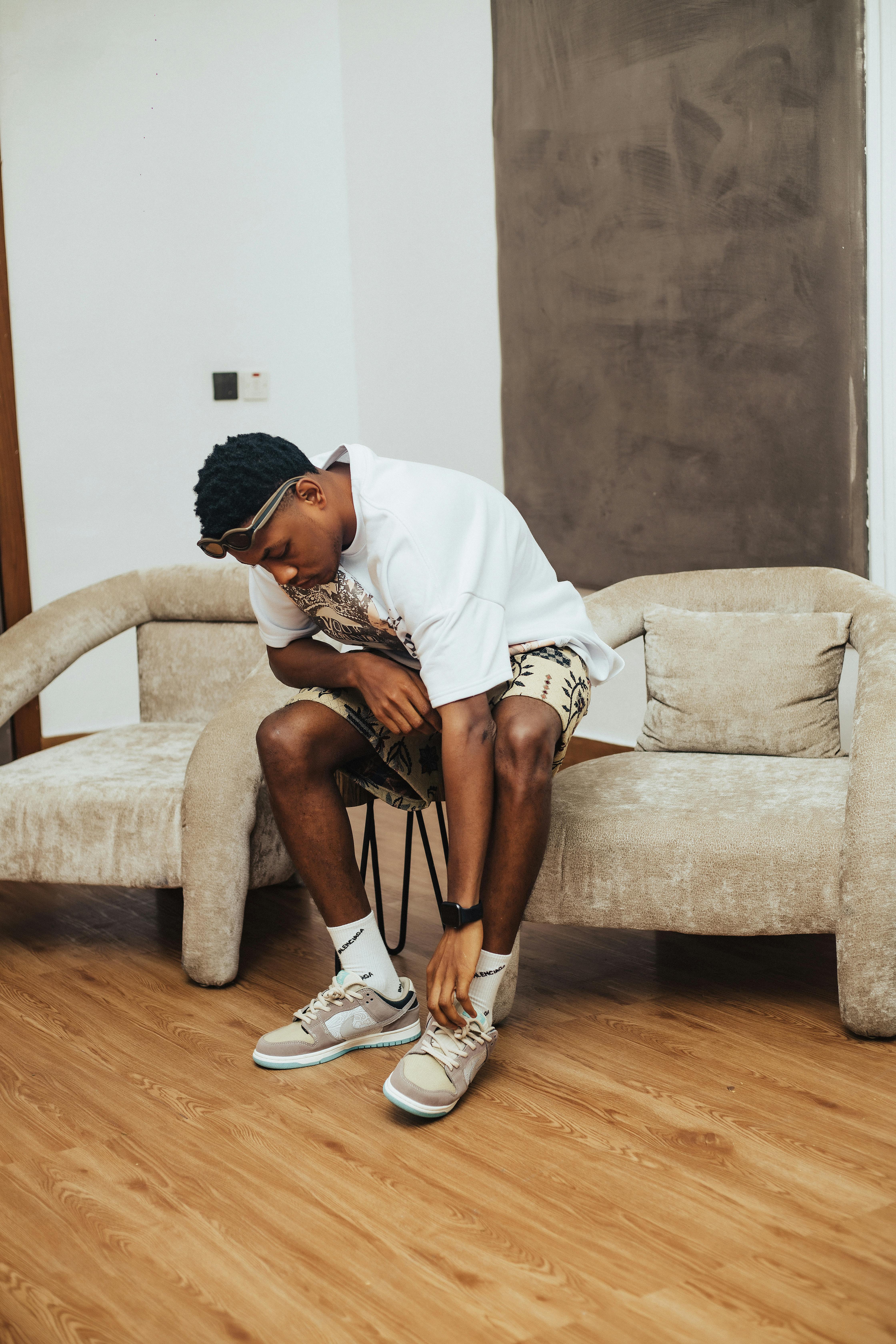 Man putting on socks